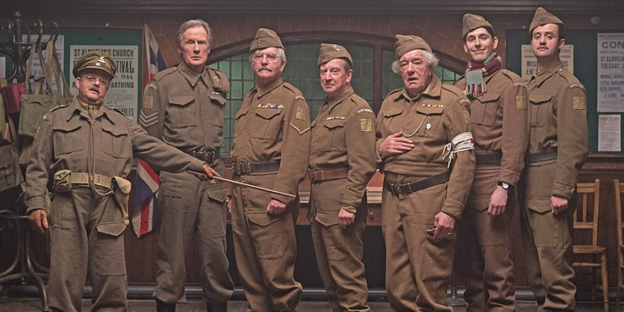 Dad's Army. Image shows from L to R: Captain George Mainwaring (Toby Jones), Sergeant Arthur Wilson (Bill Nighy), Corporal Jack Jones (Tom Courtenay), Private Frazer (Bill Paterson), Private Godfrey (Michael Gambon), Private Frank Pike (Blake Harrison), Private Joe Walker (Daniel Mays). Copyright: Universal Pictures / DJ Films