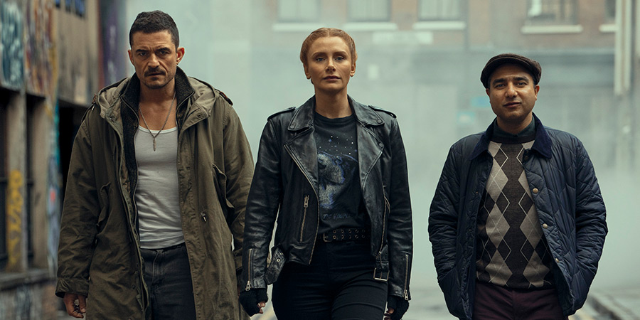 Deep Cover. Image shows left to right: Orlando Bloom, Bryce Dallas Howard, Nick Mohammed