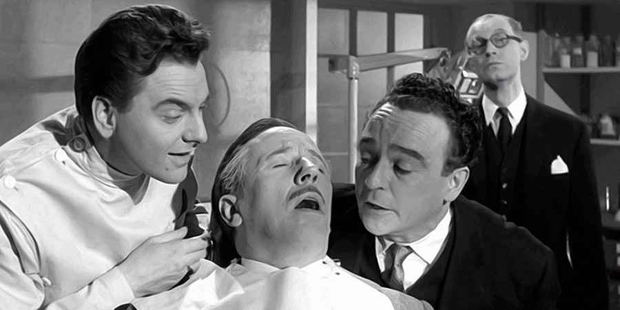 Dentist On The Job. Image shows from L to R: David Cookson (Bob Monkhouse), Mr. Duff (Reginald Beckwith), Sam Field (Kenneth Connor), Macreedy (Richard Wattis). Copyright: Bertram Ostrer Productions