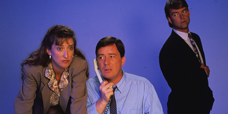 Drop The Dead Donkey. Image shows left to right: Alex Pates (Haydn Gwynne), George Dent (Jeff Rawle), Gus Hedges (Robert Duncan)