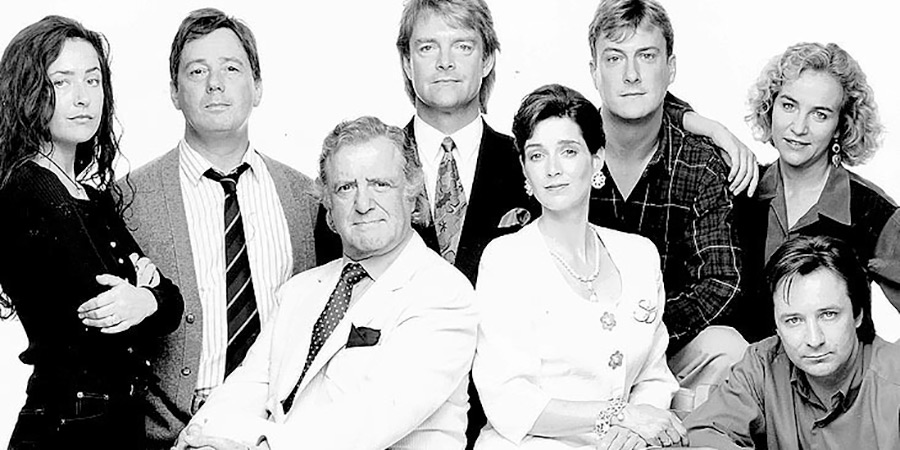 Drop The Dead Donkey. Image shows left to right: Joy Merryweather (Susannah Doyle), George Dent (Jeff Rawle), Henry Davenport (David Swift), Gus Hedges (Robert Duncan), Sally Smedley (Victoria Wicks), Damien Day (Stephen Tompkinson), Helen Cooper (Ingrid Lacey), Dave Charnley (Neil Pearson)