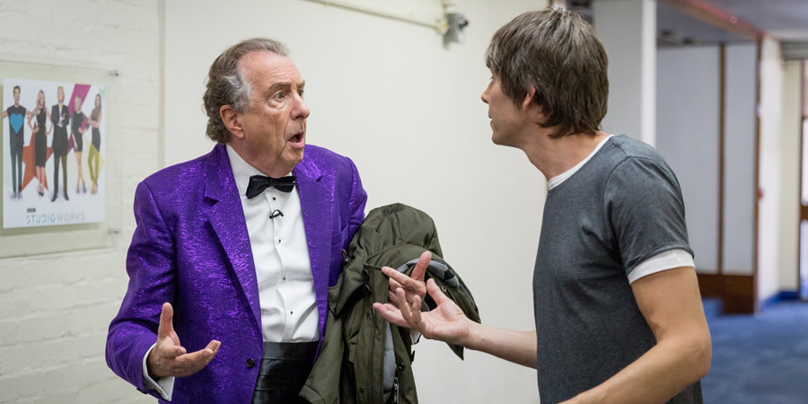 The Entire Universe. Image shows from L to R: Eric Idle, Brian Cox. Copyright: BBC / Guy Levy