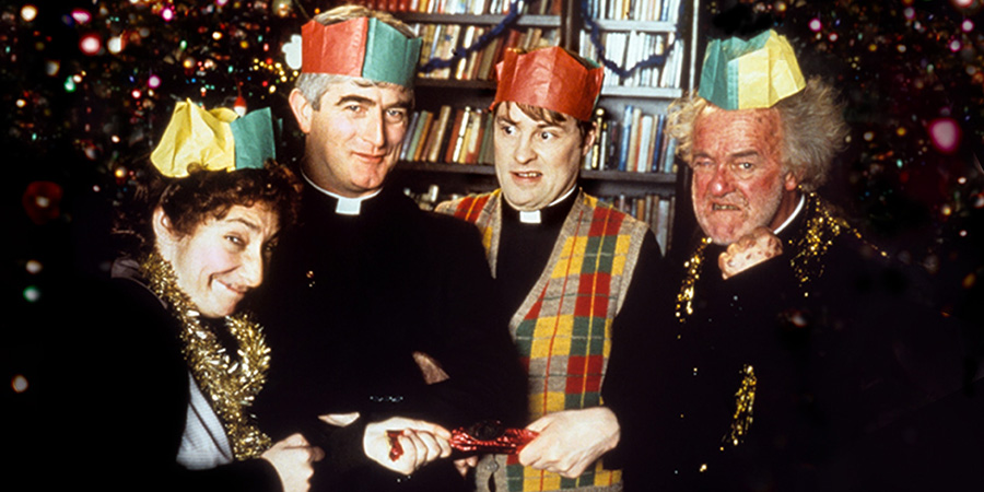 Father Ted. Image shows left to right: Mrs Doyle (Pauline McLynn), Father Ted Crilly (Dermot Morgan), Father Dougal McGuire (Ardal O'Hanlon), Father Jack Hackett (Frank Kelly). Credit: Hat Trick Productions