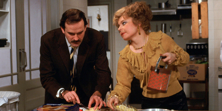 Fawlty Towers. Image shows from L to R: Basil Fawlty (John Cleese), Sybil Fawlty (Prunella Scales). Copyright: BBC