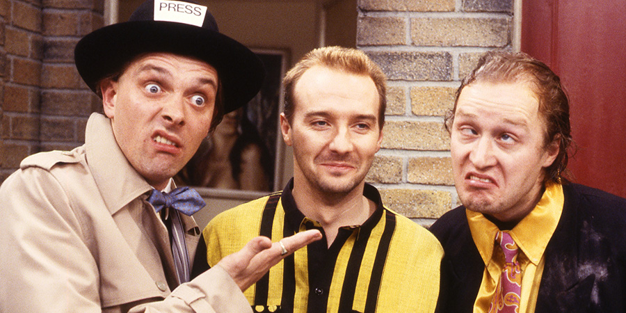 Filthy Rich & Catflap. Image shows left to right: Richie Rich (Rik Mayall), Midge Ure, Eddie Catflap (Adrian Edmondson)