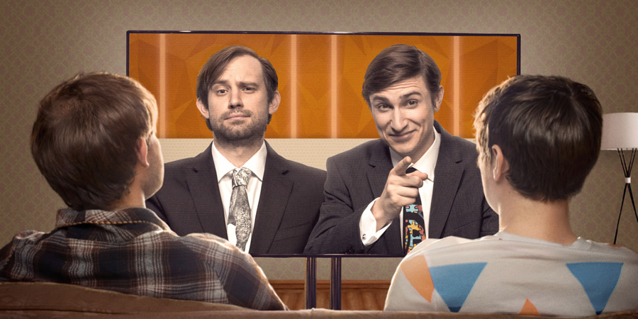 Flat TV. Image shows from L to R: Naz (Naz Osmanoglu), Tom (Tom Rosenthal). Copyright: BBC