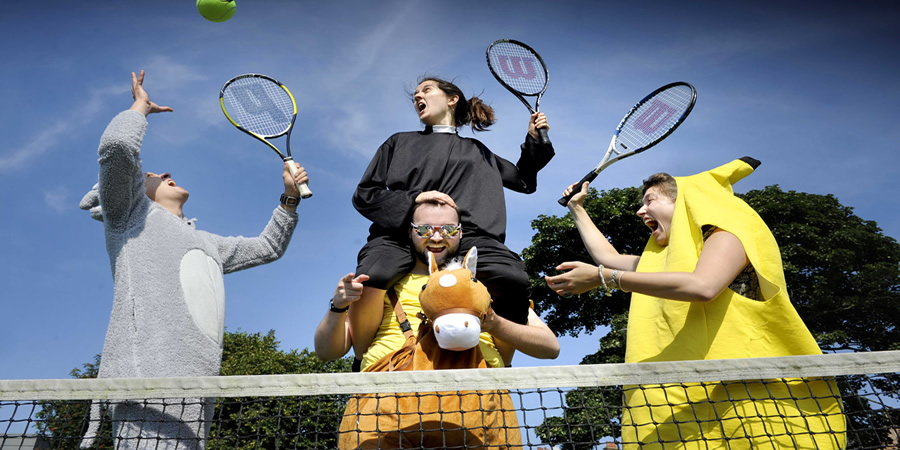 Mixed Doubles playing tennis