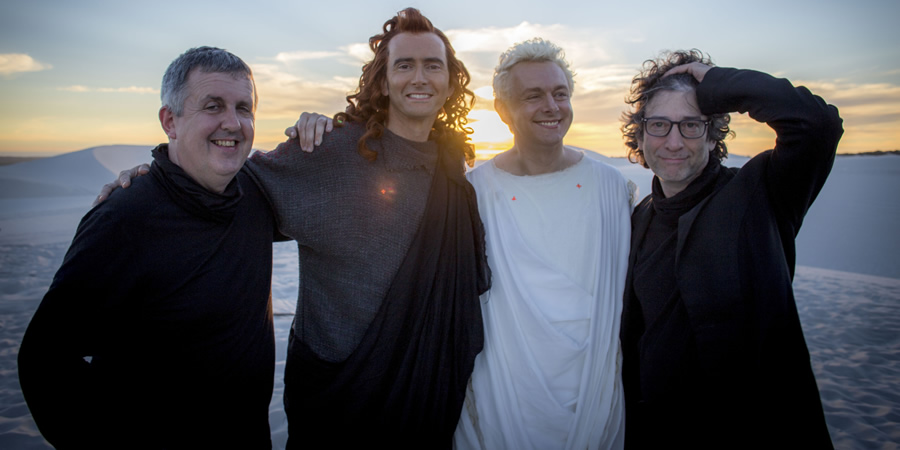 Good Omens. Image shows from L to R: Douglas Mackinnon, Crowley (David Tennant), Aziraphale (Michael Sheen), Neil Gaiman