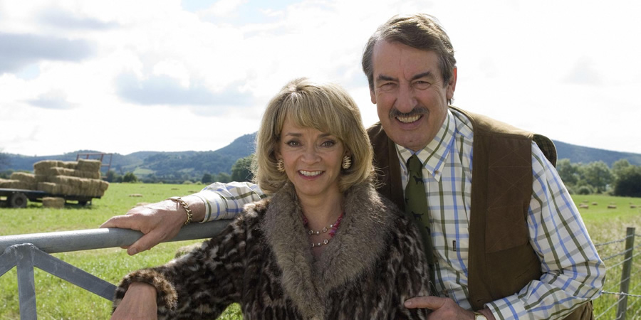 The Green Green Grass. Image shows from L to R: Marlene Boyce (Sue Holderness), Boycie (John Challis). Copyright: Shazam Productions