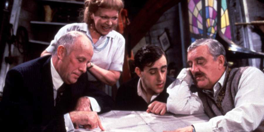 High & Dry. Image shows from L to R: Richard Talbot (Richard Wilson), Miss Baxter (Vivienne Martin), Trevor Archer (Angus Barnett), Ron Archer (Bernard Cribbins). Copyright: Yorkshire Television