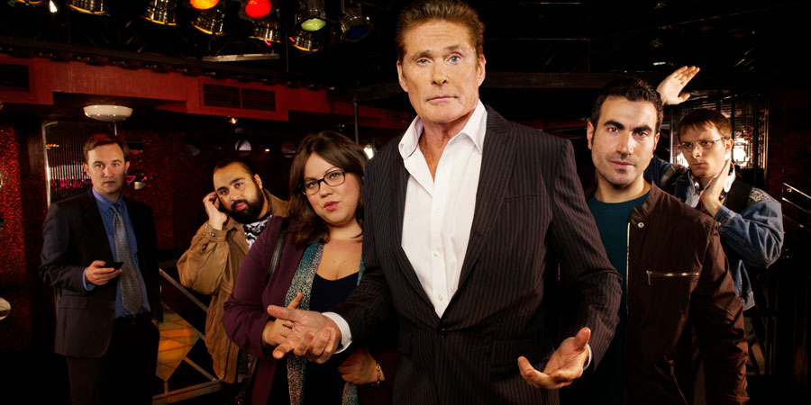 Hoff The Record. Image shows from L to R: Max Coleman (Fergus Craig), Terry Patel (Asim Chaudhry), Harriet Fitzgerald (Ella Smith), Hoff (David Hasselhoff), Danny Jones (Brett Goldstein), Dieter Hasselhoff (Mark Quartley). Copyright: Me & You Productions