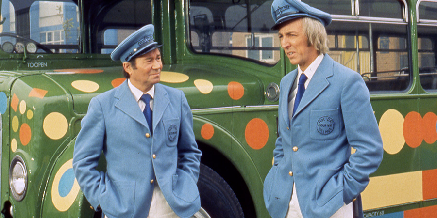 Holiday On The Buses. Image shows left to right: Stan Butler (Reg Varney), Jack Harper (Bob Grant). Credit: STUDIOCANAL