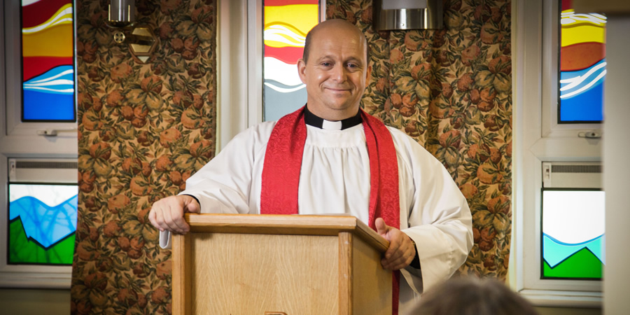 Hospital People. Father Kenny (Tom Binns). Copyright: Roughcut Television