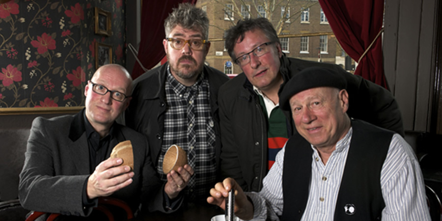 In Transit. Image shows from L to R: Ade (Adrian Edmondson), Phill (Phill Jupitus), Rowland (Rowland Rivron), Neil (Neil Innes). Copyright: Giddy Goat Productions