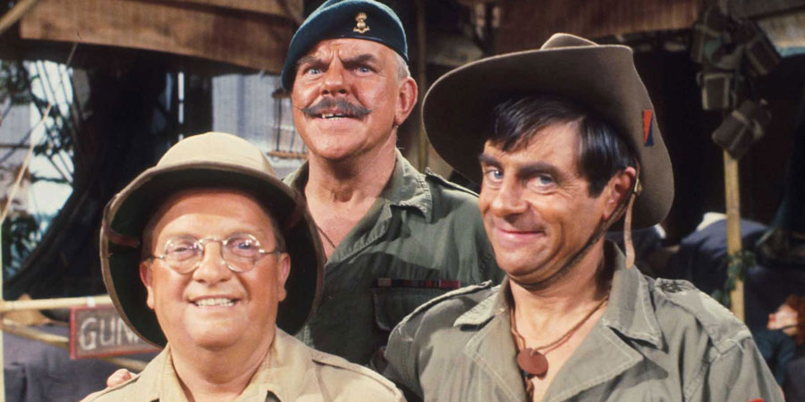 It Ain't Half Hot Mum. Image shows from L to R: Gunner 'Lofty' Sugden (Don Estelle), BSM Geoffrey 'Shut Up' Williams (Windsor Davies), Bombardier 'Gloria' Beaumont (Melvyn Hayes). Copyright: BBC