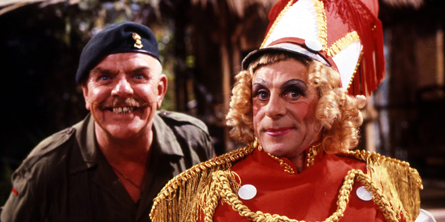 It Ain't Half Hot Mum. Image shows left to right: BSM 'Shut Up' Williams (Windsor Davies), Bombardier 'Gloria' Beaumont (Melvyn Hayes)