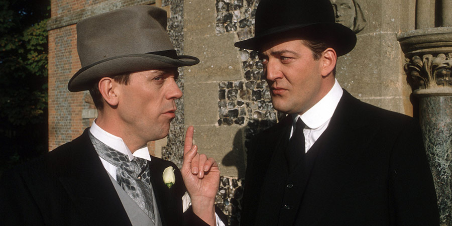 Jeeves And Wooster. Image shows from L to R: Bertie Wooster (Hugh Laurie), Jeeves (Stephen Fry)