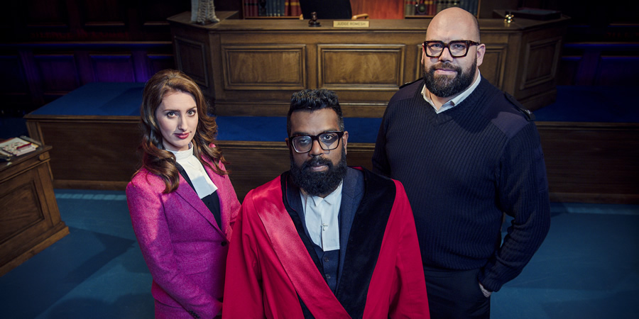 Judge Romesh. Image shows from L to R: Court Clerk (Jessica Knappett), Romesh Ranganathan, Court Bailiff (Tom Davis). Copyright: Hungry Bear Media