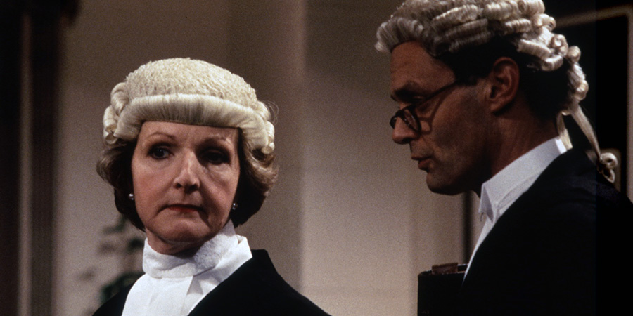 Law And Disorder. Image shows left to right: Phillippa Troy (Penelope Keith), Gerald Triggs (Simon Williams)