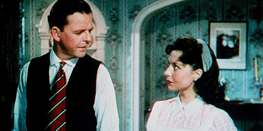 Made In Heaven. Image shows from L to R: Basil Topham (David Tomlinson), Marta (Sonja Ziemann). Copyright: ITV