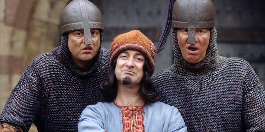 Maid Marian And Her Merry Men. Image shows from L to R: Gary (Mark Billingham), The Sheriff of Nottingham (Tony Robinson), Graeme (David Lloyd). Copyright: BBC