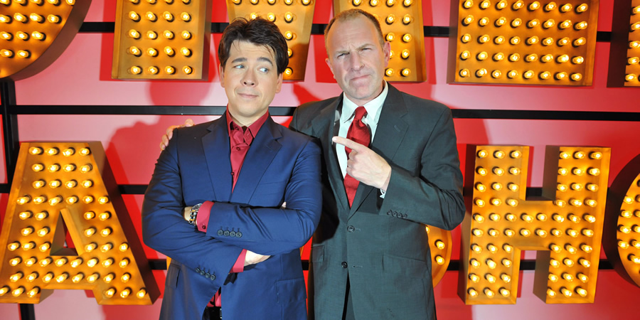 Michael McIntyre's Comedy Roadshow. Image shows from L to R: Michael McIntyre, Simon Evans. Copyright: Open Mike Productions