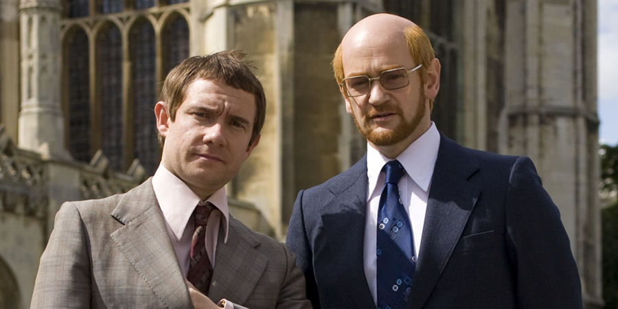 Micro Men. Image shows from L to R: Chris Curry (Martin Freeman), Sir Clive Sinclair (Alexander Armstrong). Copyright: DSP