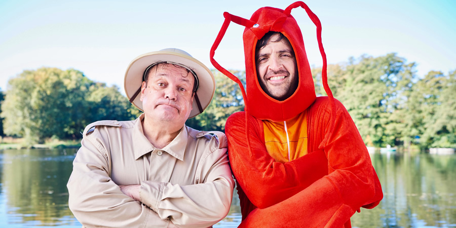 Mister Winner. Image shows from L to R: Chris Smith (Shaun Williamson), Lesley Winner (Spencer Jones). Copyright: BBC