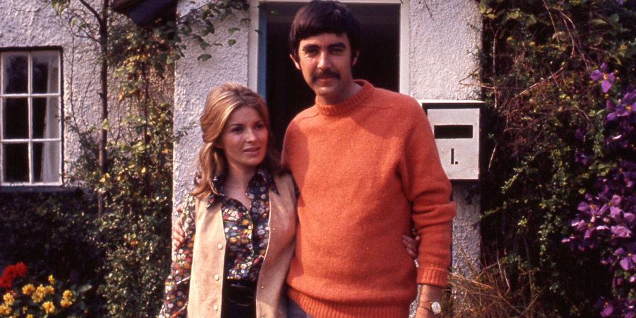 My Wife Next Door. Image shows from L to R: Suzy Bassett (Hannah Gordon), George Bassett (John Alderton). Copyright: BBC