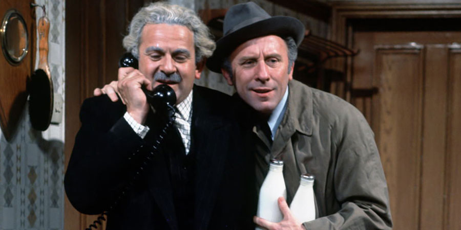 Never Mind The Quality, Feel The Width. Image shows from L to R: Emmanuel 'Manny' Cohen (John Bluthal), Patrick Kelly (Joe Lynch). Copyright: Thames Television / ABC Television