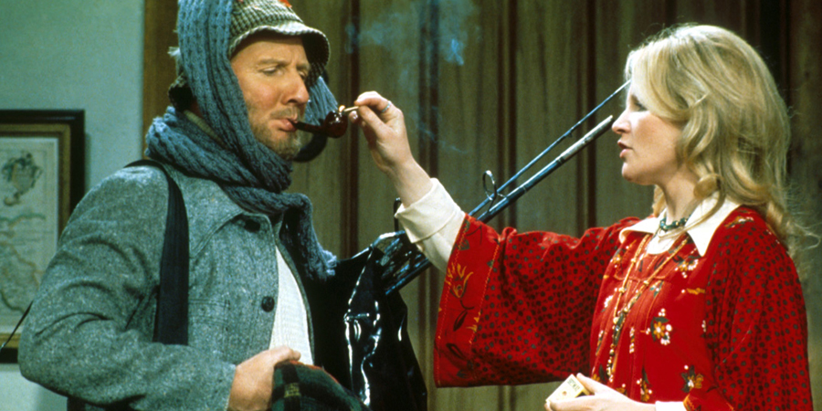 Not Now, Comrade. Image shows from L to R: Commander Rimmington (Leslie Phillips), Nancy Rimmington (Michele Dotrice). Copyright: Not Now Films Limited