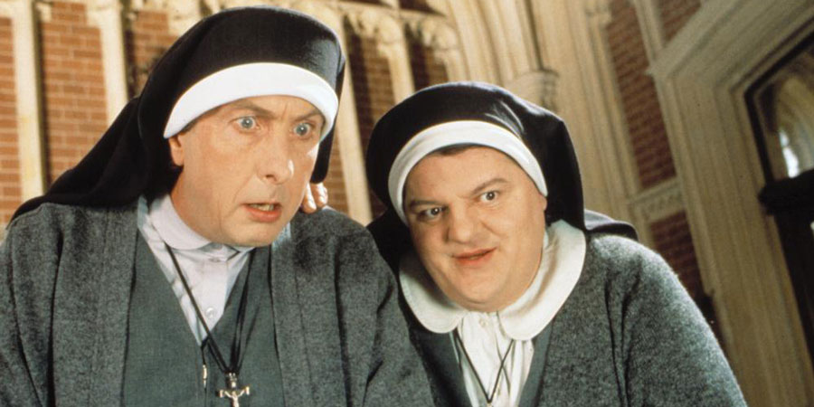 Nuns On The Run. Image shows from L to R: Brian Hope (Eric Idle), Charlie McManus (Robbie Coltrane). Copyright: Hand Made Films