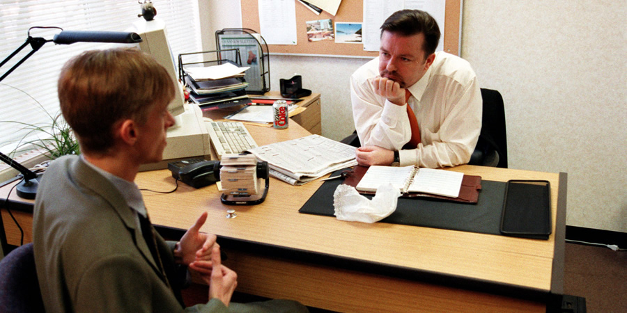 The Office. Image shows from L to R: Gareth Keenan (Mackenzie Crook), David Brent (Ricky Gervais). Copyright: BBC