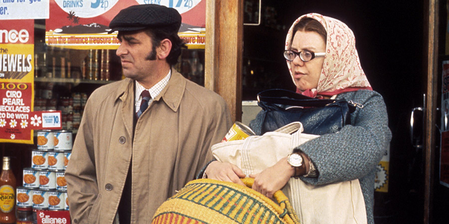 On The Buses. Image shows from L to R: Arthur Rudge (Michael Robbins), Olive (Anna Karen). Copyright: Hammer Film Productions