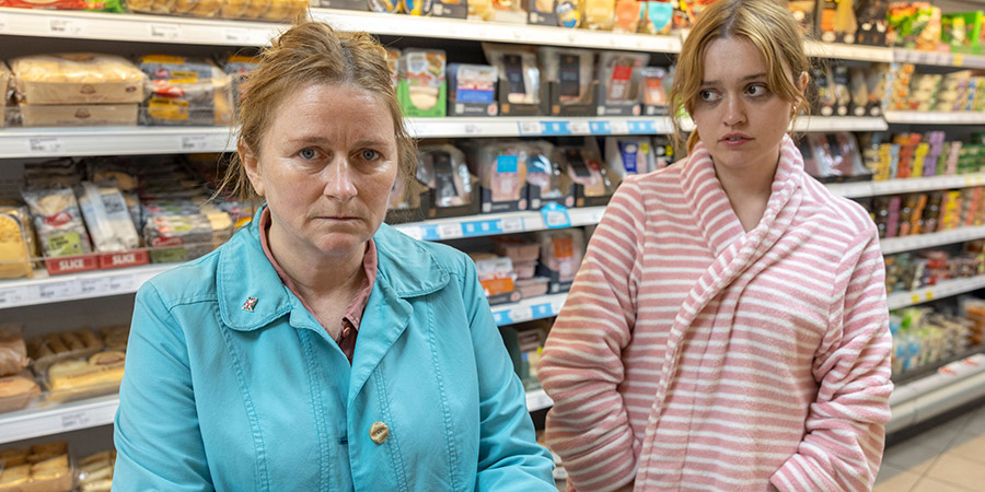 Mincemeat. Image shows from L to R: Carol (Rosie Cavaliero), Jane (Aimee Lou Wood)