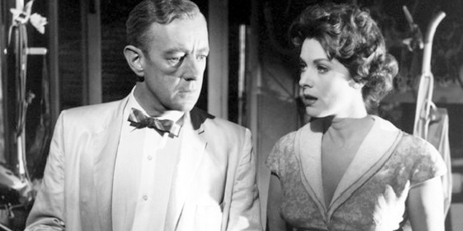 Our Man In Havana. Image shows left to right: Jim Wormold (Alec Guinness), Beatrice Severn (Maureen O'Hara). Credit: Columbia Pictures