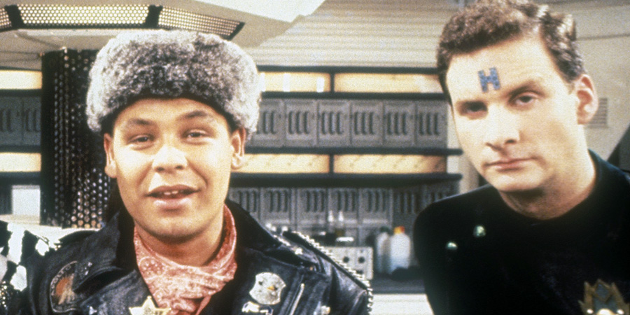 Red Dwarf. Image shows left to right: Lister (Craig Charles), Rimmer (Chris Barrie). Credit: BBC