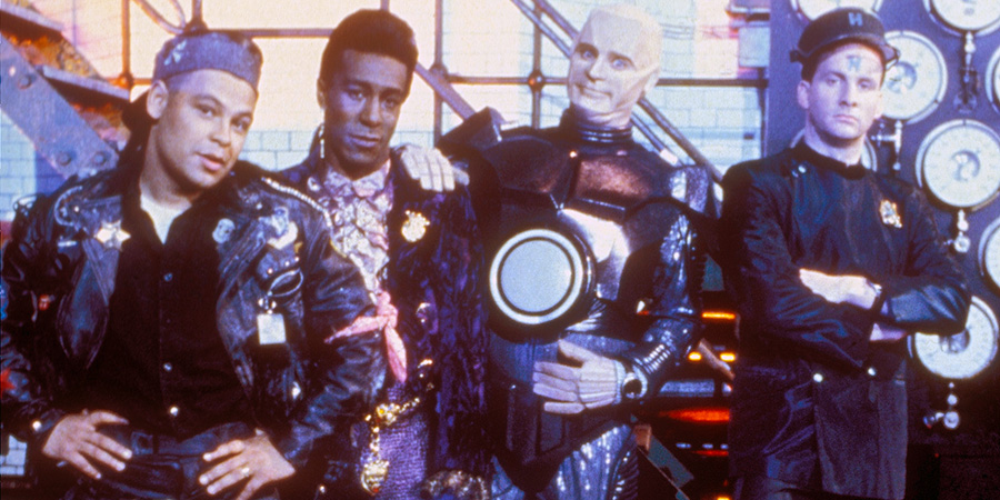 Red Dwarf. Image shows left to right: Lister (Craig Charles), Cat (Danny John-Jules), Kryten (Robert Llewellyn), Rimmer (Chris Barrie). Credit: BBC