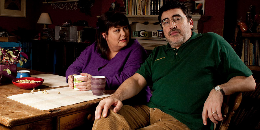 Roger & Val Have Just Got In. Image shows from L to R: Val Stevenson (Dawn French), Roger Stevenson (Alfred Molina). Copyright: BBC