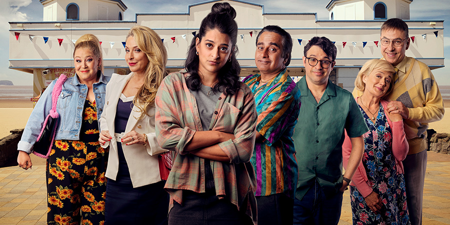 Sandylands. Image shows from L to R: Tina Taylor (Harriet Webb), Donna Vegas (Tracy-Ann Oberman), Emily Verma (Natalie Dew), Les Vegas (Sanjeev Bhaskar), Nathan Wild (Simon Bird), Jeannie Swallows (Sophie Thompson), Derek Swallows (David Walliams). Copyright: King Bert Productions Sandylands. Image shows from L to R: Tina Taylor (Harriet Webb), Donna Vegas (Tracy-Ann Oberman), Emily Verma (Natalie Dew), Les Vegas (Sanjeev Bhaskar), Nathan Wild (Simon Bird), Jeannie Swallows (Sophie Thompson), Derek Swallows (David Walliams). Copyright: King Bert Productions