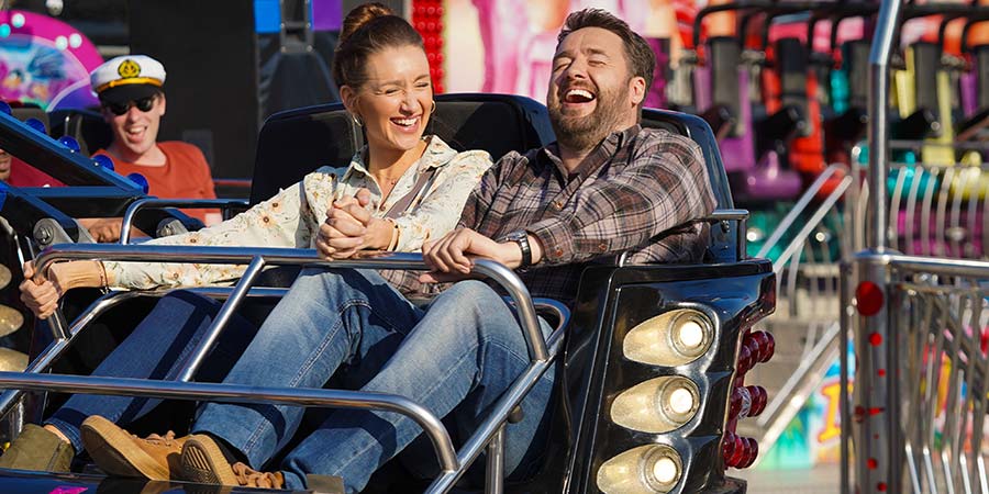 Scarborough. Image shows from L to R: Karen (Catherine Tyldesley), Mike (Jason Manford). Copyright: BBC Studios