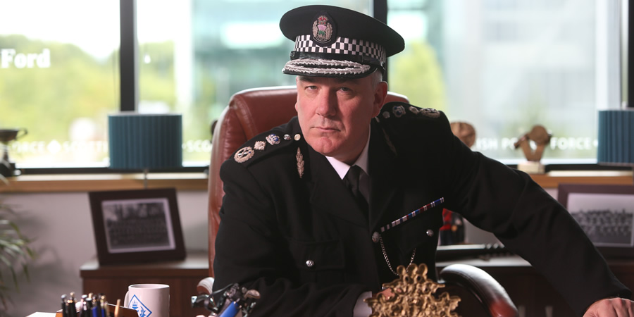 Scot Squad. Chief Commissioner Cameron Miekelson (Jack Docherty). Copyright: The Comedy Unit