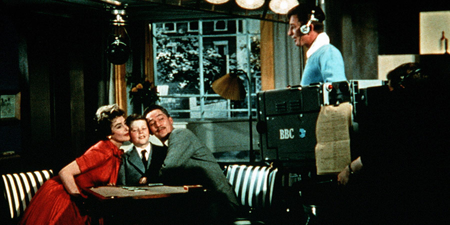 Simon And Laura. Image shows from L to R: Laura Foster (Kay Kendall), Timothy (Clive Parritt), Simon Foster (Peter Finch), Barney (Terence Longdon)