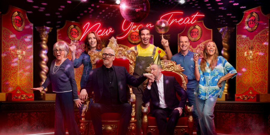 Taskmaster. Image shows left to right: Sue Johnston, Hannah Fry, Greg Davies, David James, Alex Horne, Martin Lewis, Melanie Blatt. Credit: Avalon Television, Channel 4 Television Corporation