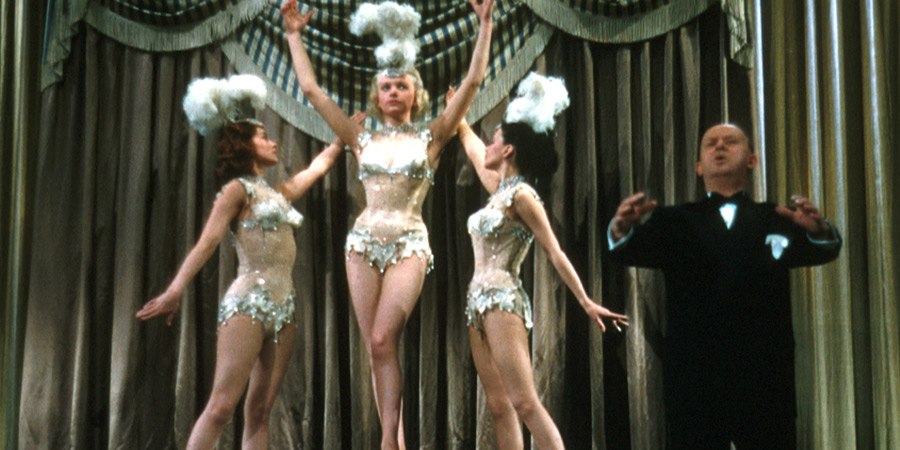 The Good Companions. Image shows from L to R: The Three Graces (Shirley Anne Field), The Three Graces (Margaret Simons), The Three Graces (Kim Parker), Mr. Joe (John Salew)