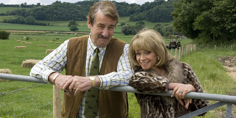The Green Green Grass. Image shows from L to R: Boycie (John Challis), Marlene Boyce (Sue Holderness). Copyright: Shazam Productions