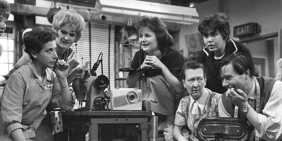 The Rag Trade. Image shows left to right: Paddy Fleming (Miriam Karlin), Carole Taylor (Sheila Hancock), Brenda (Ann Beach), Lily Swann (Esma Cannon), Myrtle (Claire Davenport), Reg Turner (Reg Varney). Credit: BBC