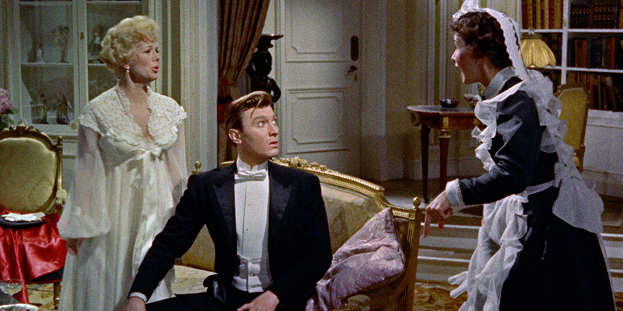 The Truth About Women. Image shows left to right: Louise (Eva Gabor), Humphrey Tavistock (Laurence Harvey)