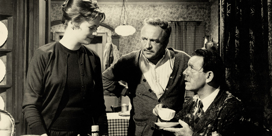 There Was A Crooked Man. Image shows from L to R: Ellen Foster (Susannah York), Foster, Station Master (Reginald Beckwith), Davy Cooper (Norman Wisdom)