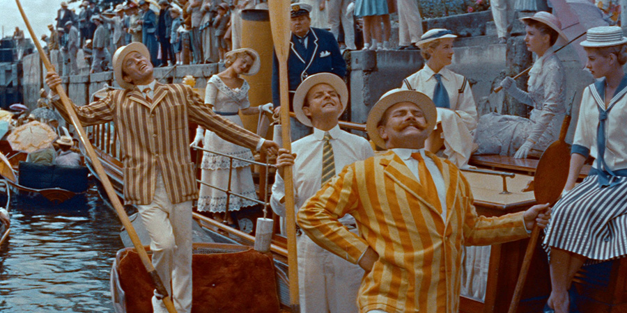 Three Men In A Boat. Image shows left to right: George (Laurence Harvey), Sophie Clutterbuck (Shirley Eaton), Mr. Porterhouse (Campbell Cotts), J (David Tomlinson), Harris (Jimmy Edwards), Primrose Porterhouse (Lisa Gastoni), Bluebell Porterhouse (Jill Ireland). Credit: STUDIOCANAL